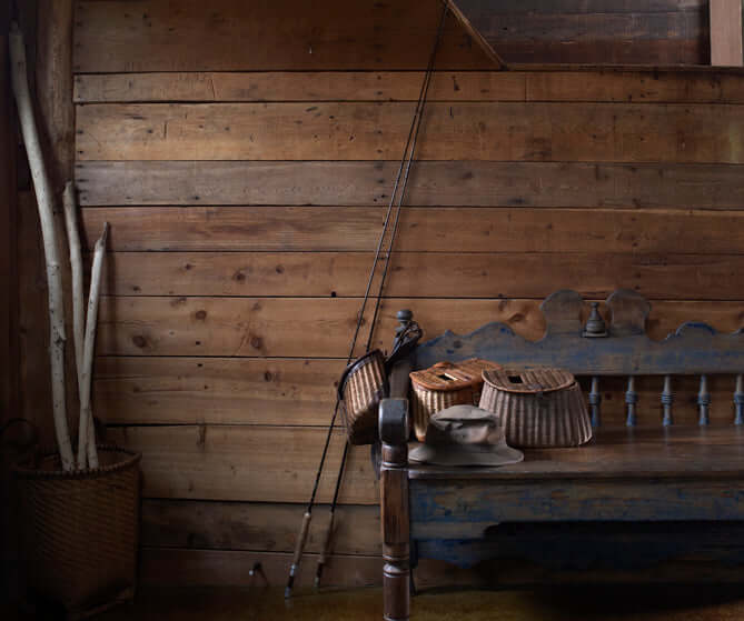 Restored barn foyer with barn board and bench