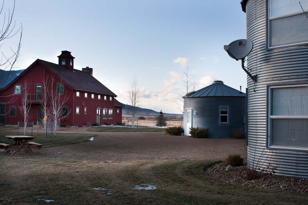Farm scenery with barn and two silos