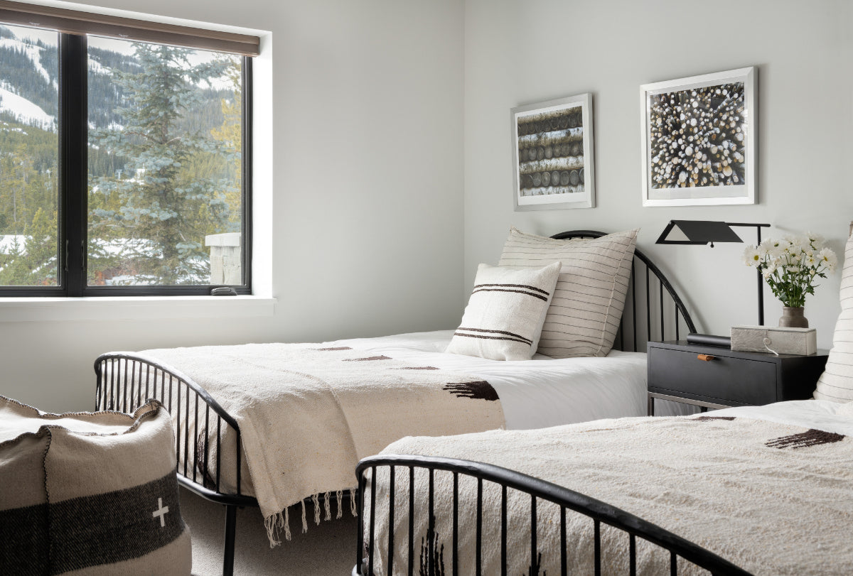 Guest bedroom with two full beds