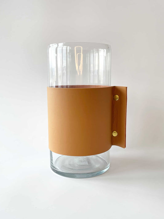 Glass and leather vase