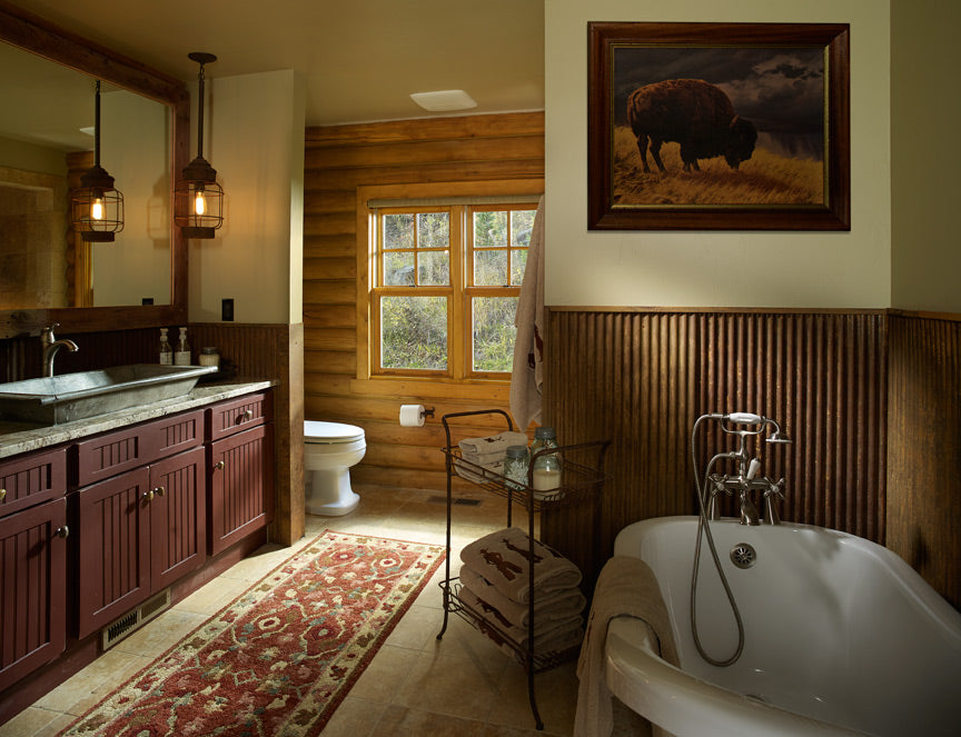 Rustic bathroom with basin sink and clawfoot bathtub