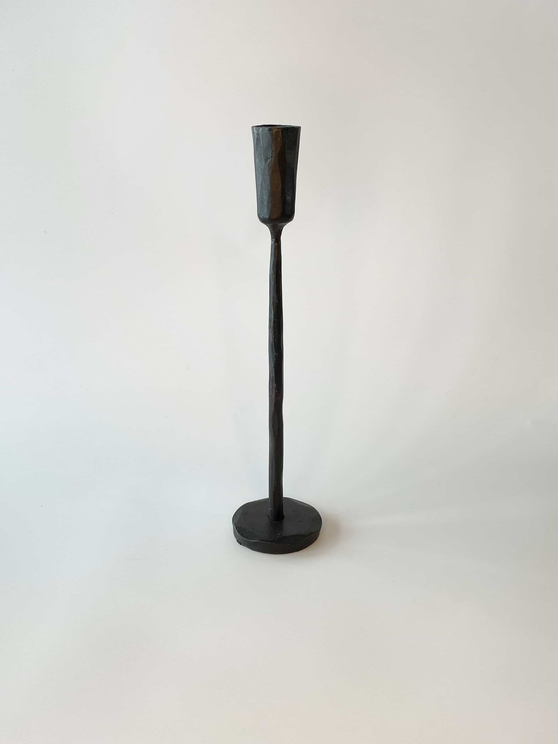 Medium textured black tapered candle holder