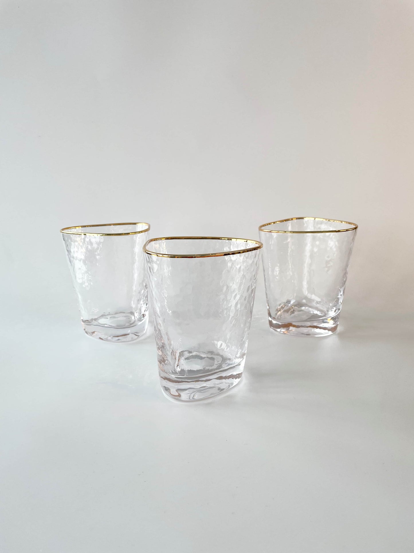 Short gold rimmed glass