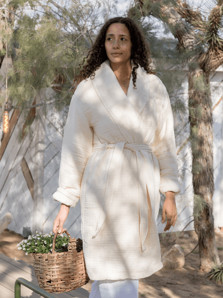 Alaia coconut sherpa robe on model