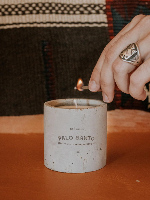 Palo Santo candle being lit
