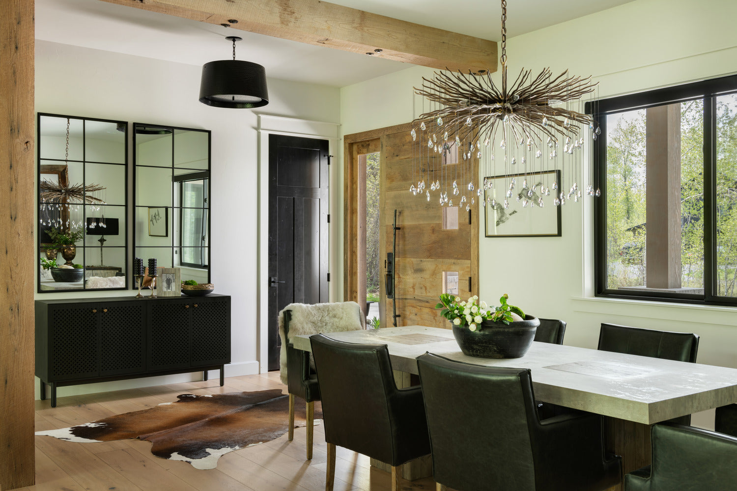 Transitional dining room with wooden beams, ornate chandelier