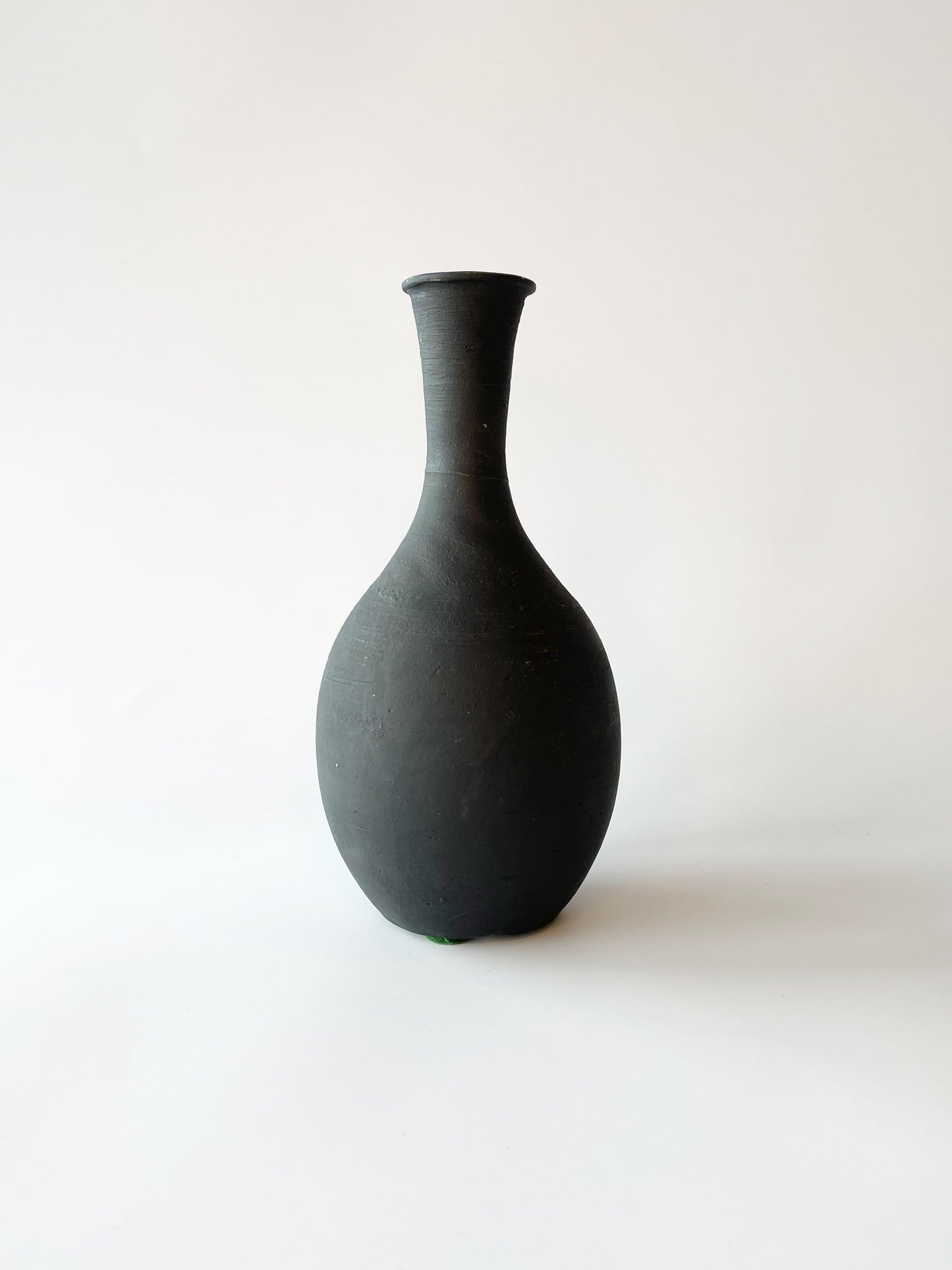 Black geometric vessel