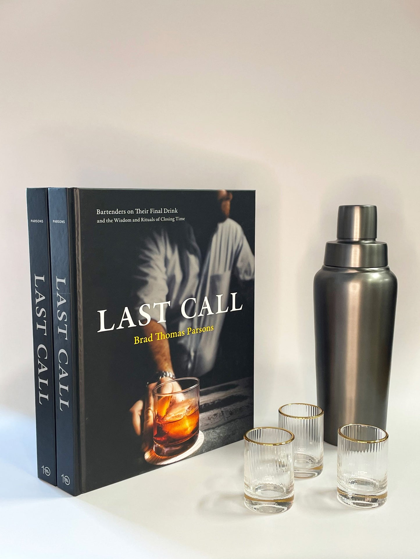 Last Call book by Brad Thomas Parsons with shaker bottle
