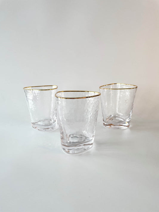 Short gold rimmed glass