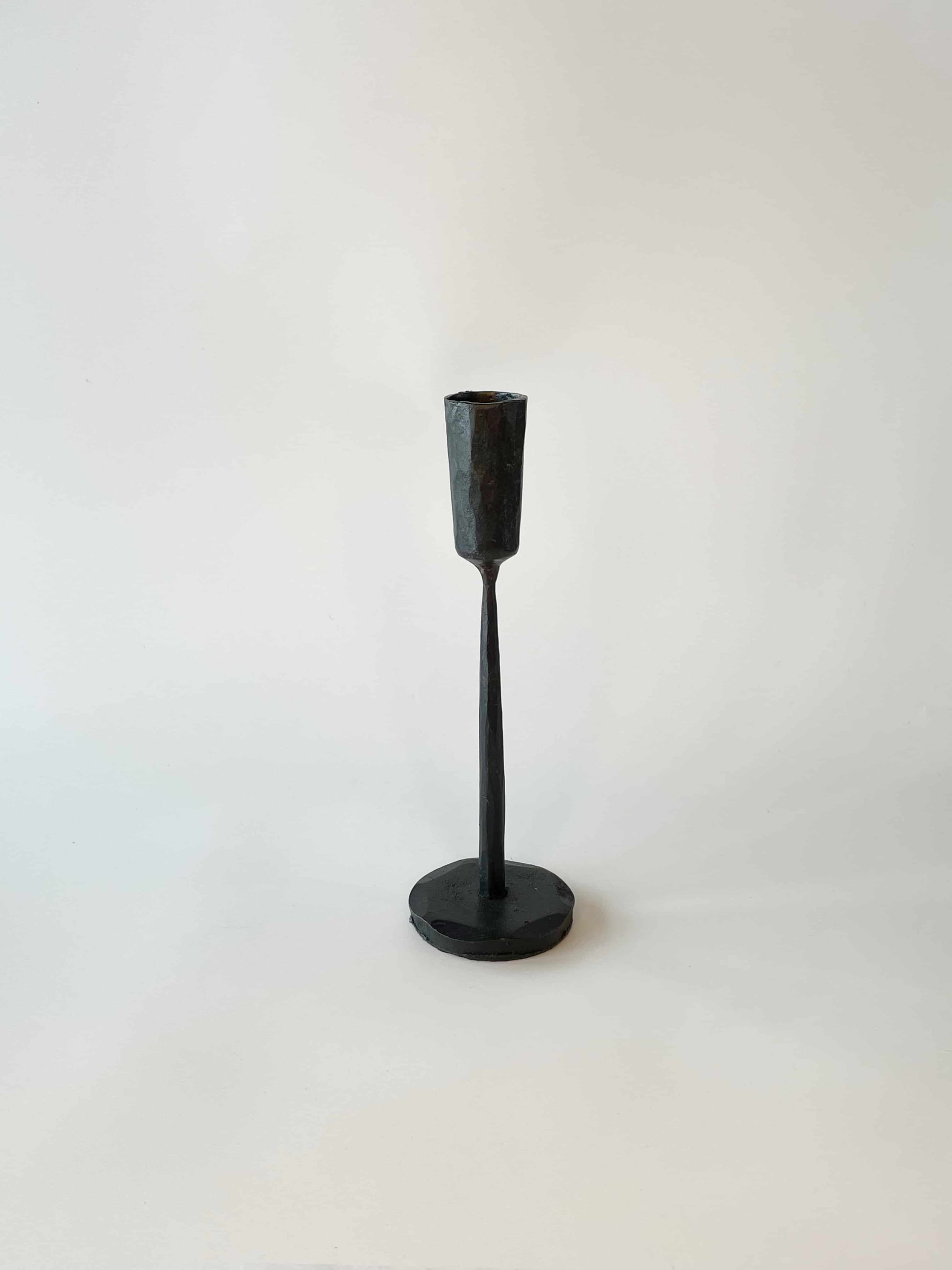 Short textured black tapered candle holder
